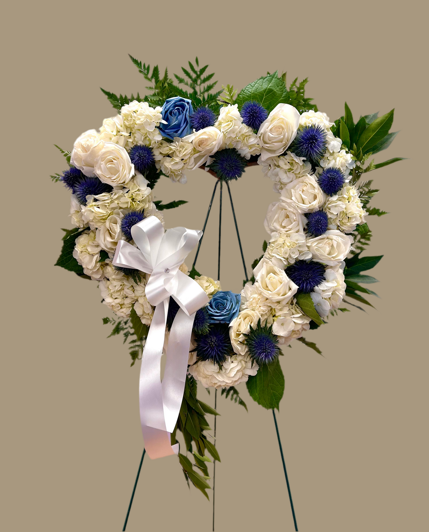 Blue Blossoms Open Heart Funeral Arrangement