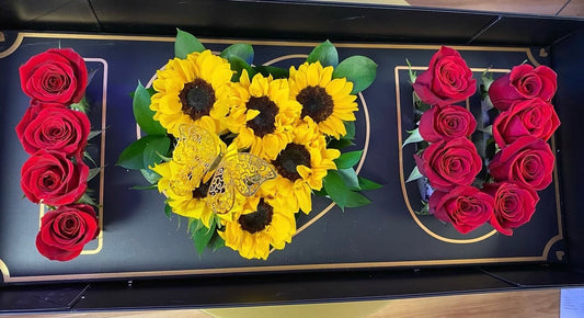 Sunflowers and red roses