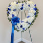 Blue Blossoms Open Heart Funeral Arrangement