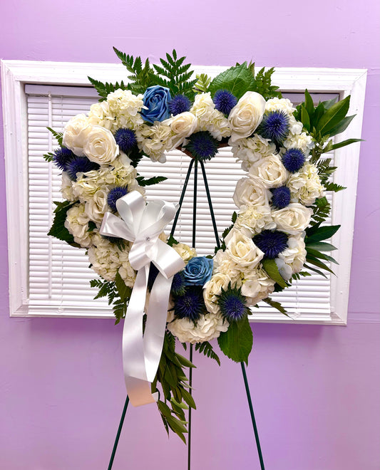 Blue Blossoms Open Heart Funeral Arrangement